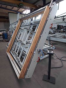 Tilting table for sliding door frame